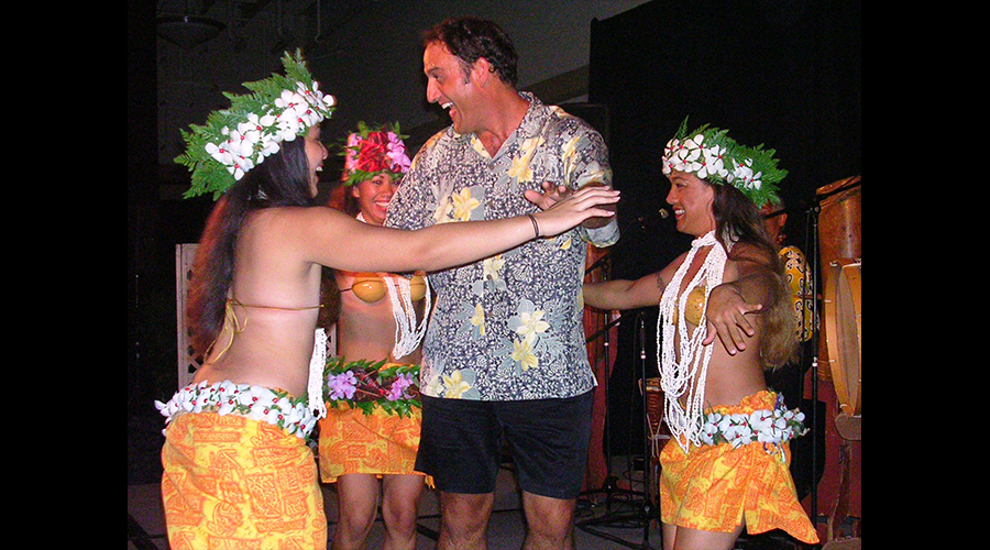Participant learning hula at Hawaii Summit