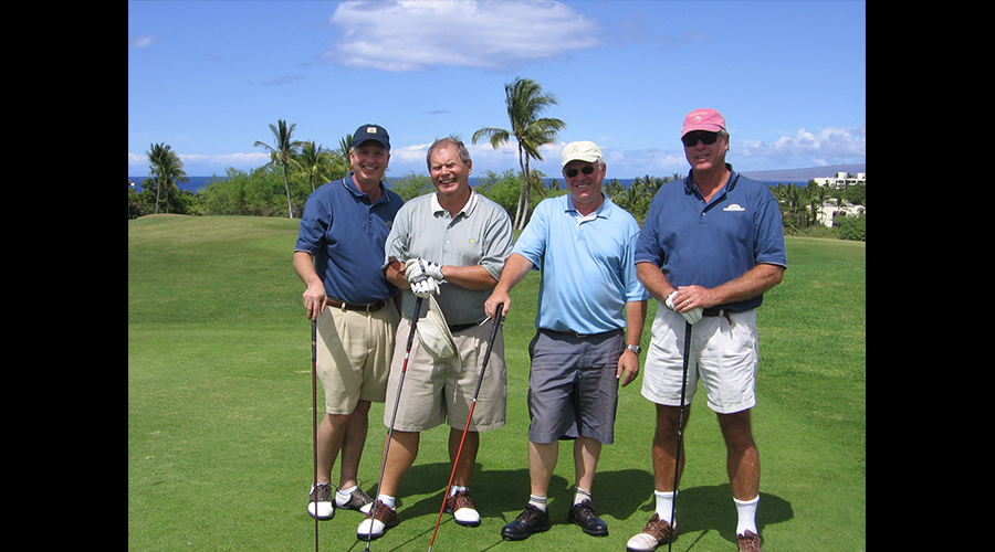 Four participants golfing at Hawaii Summit